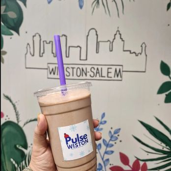 Pulse Winston - a hand holding a cup of coffee - Juice Bars & Smoothies Near Me - Winston-Salem, North Carolina Pulse Winston - a hand holding a cup of coffee - Juice Bars & Smoothies Near Me - Winston-Salem, North Carolina