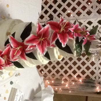 Confections By Lynn - a wedding cake decorated with flowers - Bakeries Near Me - Willis, Michigan