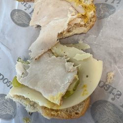 Safeway - A sad ass sandwich nothing on it, and I brought it down in a piece of paper exactly what I wanted and this is what I get