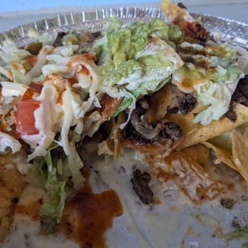 Mota Tacos - Nachos- the smashed/refried burns were a deep red and tied the dish together well. - Tacos Near Me - Indianapolis, Indiana
