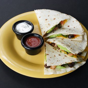 Cafe Yumm! - RiverBend - a tortilla cut in half with a side of ketchup - Salad Near Me - Springfield, Oregon
