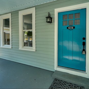 Hutson Construction - a porch with a blue door - General Contractors Near Me - Wilmington, North Carolina Hutson Construction - a porch with a blue door - General Contractors Near Me - Wilmington, North Carolina