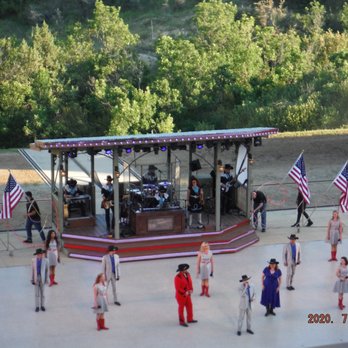 Medora Musical - a band performing on a stage - Restaurants Near Me