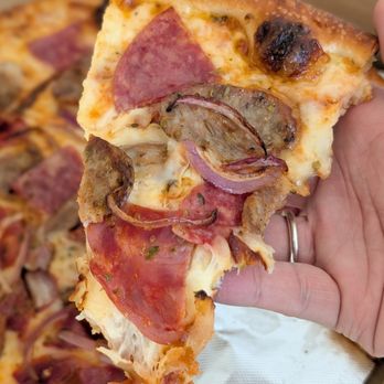 Mona Lisa Cucina - Siciliana Pizza: Tomato sauce, salami, sausage, cappicola, oregano, red onions and mozzarella. - Italian Near Me - Huntington Beach, California Mona Lisa Cucina - Siciliana Pizza: Tomato sauce, salami, sausage, cappicola, oregano, red onions and mozzarella. - Italian Near Me - Huntington Beach, California