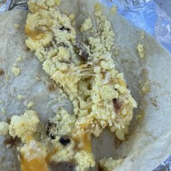 QuikTrip - A scrambled egg burrito with a couple slivers of meat.... Hella disappointing