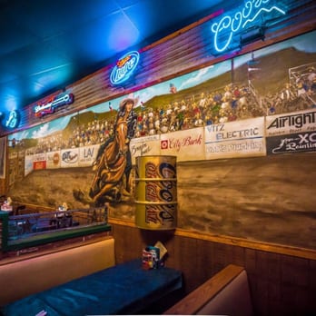 Caprock Cafe - a cowboy on a bucking horse - Sports Bars Near Me - Lubbock, Texas Caprock Cafe - a cowboy on a bucking horse - Sports Bars Near Me - Lubbock, Texas