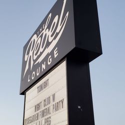 The Rebel Lounge - The exterior sign is easy to see from the road and sidewalk, and has a signature, classic look.