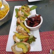 Photo of Green Door Cafe - La Jolla, CA, United States. Avocado toast with side of coconut bacon. Yeah I said it coconut bacon.