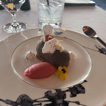 Coastal Kitchen Monterey - Desserts: raspberry champagne sorbet, chocolate mousse, macadamia nut Carmel, and dark chocolate, ginger & pumpkin bite - Seafood Near Me - Monterey, California