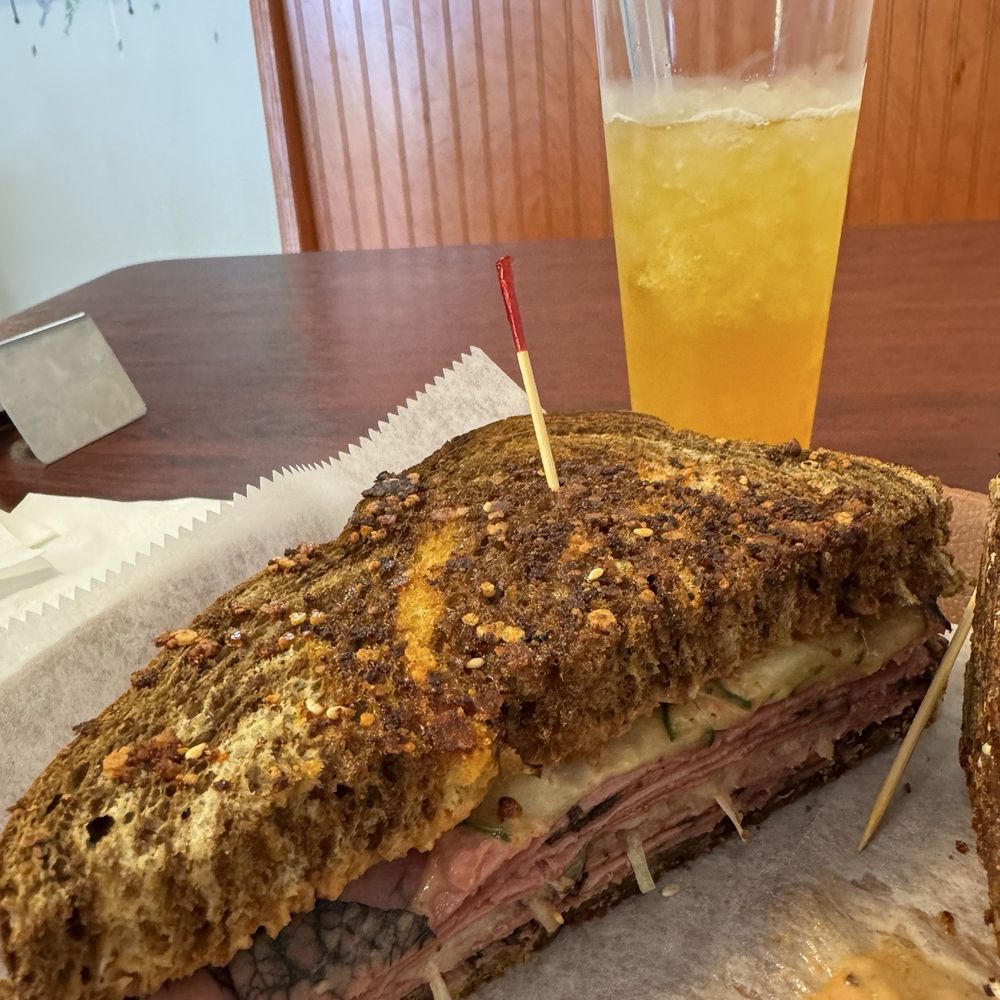Reuben sandwich and mango tea Reuben sandwich and mango tea