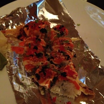 Sushi Train - Dragon on fire roll. Favorite roll here - Sushi Bars Near Me - Romeoville, Illinois Sushi Train - Dragon on fire roll. Favorite roll here - Sushi Bars Near Me - Romeoville, Illinois