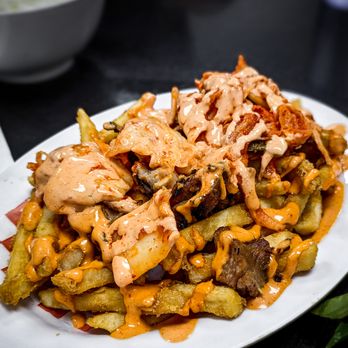 Good Pho You - Kimchi Fries Crispy fries topped with your choice of meat, kimchi, and spicy mayo. - Vietnamese Near Me - Ajax, Ontario