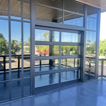 Generations Doors & Docks - Clopay Full View in on the second floor of an office patio - Door Sales/Installation Near Me