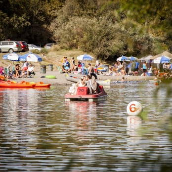 Shannon Casey Photography - arriving by paddle boat - Photographers Near Me