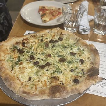 Pizzeria Mercato - e special last night was a shredded brussel sprout with chunks of guanciale and pecorino - Pizza Near Me - Carrboro, North Carolina Pizzeria Mercato - e special last night was a shredded brussel sprout with chunks of guanciale and pecorino - Pizza Near Me - Carrboro, North Carolina