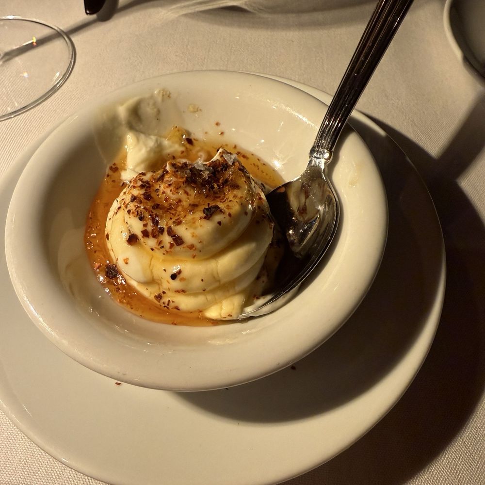 Bistecca - This is the fresh ricotta with pepper flakes and honey that comes with the focaccia bread - Italian Near Me - Las Vegas, Nevada Bistecca - This is the fresh ricotta with pepper flakes and honey that comes with the focaccia bread - Italian Near Me - Las Vegas, Nevada