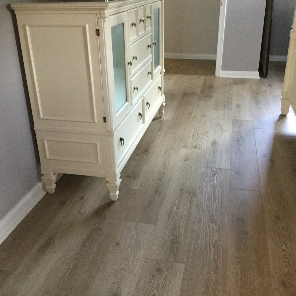Dolphin Carpet & Tile - a hardwood floor in a bedroom - Flooring Near Me - Miami, Florida Dolphin Carpet & Tile - a hardwood floor in a bedroom - Flooring Near Me - Miami, Florida