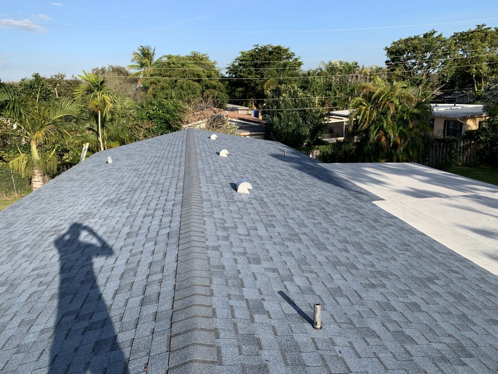 Slide of H American Roofing