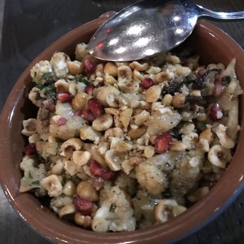 Mita's Restaurant and Bar - Cauliflower dish with nuts and pomegranate seeds - Spanish Near Me - Cincinnati, Ohio Mita's Restaurant and Bar - Cauliflower dish with nuts and pomegranate seeds - Spanish Near Me - Cincinnati, Ohio
