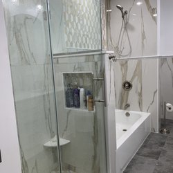 Tiles Unlimited - Master bathroom shower and bath.