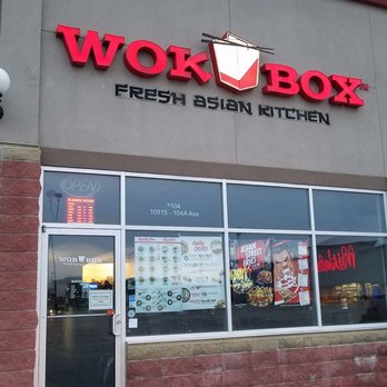 Wok Box - a woman walking past a wok - a - box restaurant - Chinese Near Me - Grande Prairie, Alberta Wok Box - a woman walking past a wok - a - box restaurant - Chinese Near Me - Grande Prairie, Alberta