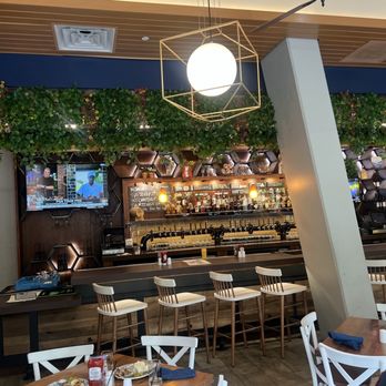 Tupelo Honey Southern Kitchen & Bar - Tables and bar area - Southern Near Me - Arlington, Virginia