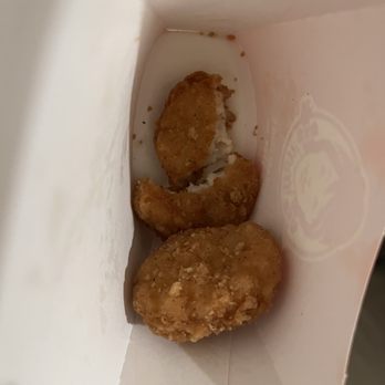 Wendy's - someone took a bite out of chicken nugget and put it at the bottom - Burgers Near Me - Lowell, Massachusetts Wendy's - someone took a bite out of chicken nugget and put it at the bottom - Burgers Near Me - Lowell, Massachusetts