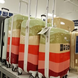 Marshalls - Great name brands,  even in the luggage selection. Nicole Miller.