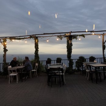 Kasai - Outdoor seating would be beautiful in the right weather. - Italian Near Me - Praiano, SA Kasai - Outdoor seating would be beautiful in the right weather. - Italian Near Me - Praiano, SA