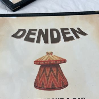Den Den Restaurant - a sign for denden - Vegetarian Near Me - Chicago, Illinois
