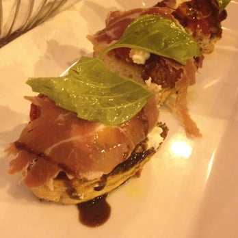 Petterinos - Tomato Bruschetta - Ricotta, Prosciutto di Parma - American Near Me - Chicago, Illinois Petterinos - Tomato Bruschetta - Ricotta, Prosciutto di Parma - American Near Me - Chicago, Illinois