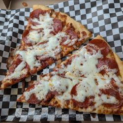 Moon Pizza and Subs - Two slices of pepperoni pizza for $6.99. almost more than I can eat. Almost!