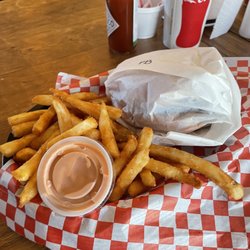 Browning's Restaurant and Motel - Pastrami burger and fries delivered to table