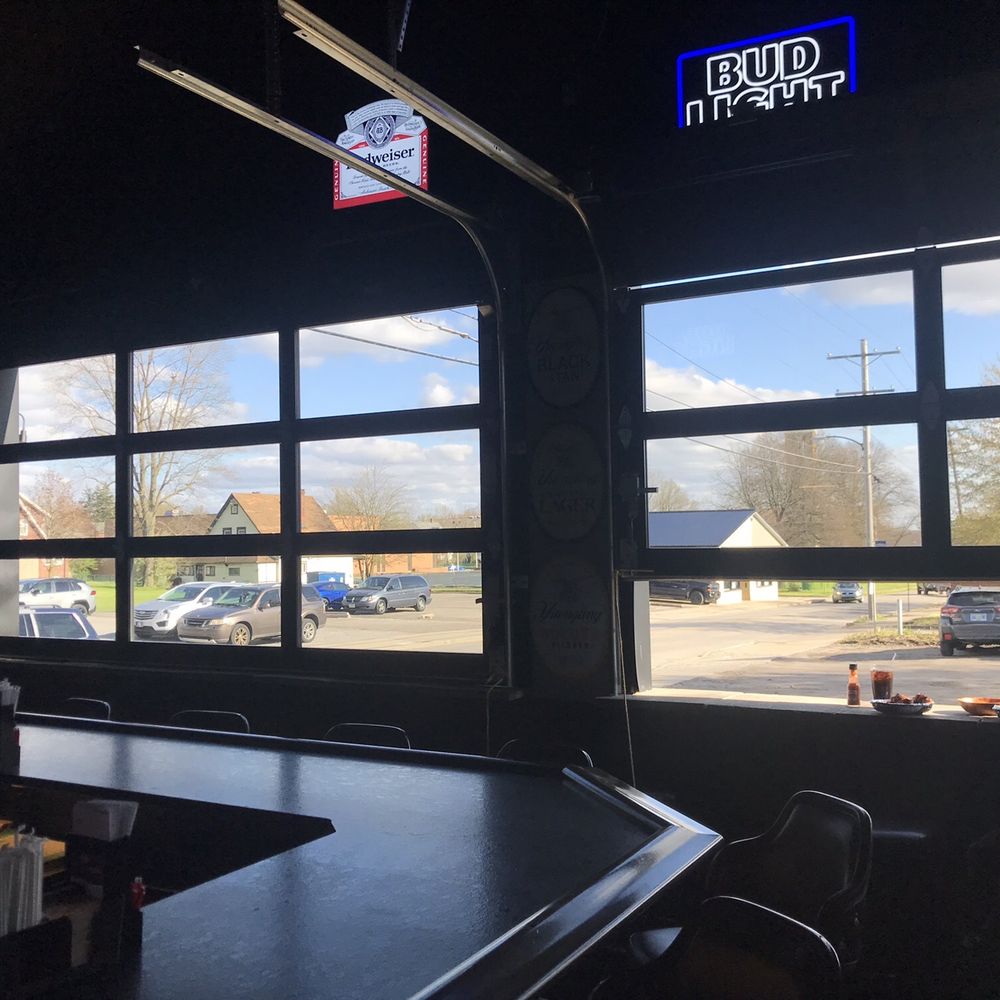 Tavern 26 - Large room to the side, garage doors open on nice days. And a wrapped bar. - Sports Bars Near Me - Campbell, Ohio