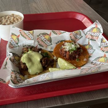Tacos Veganos - Pollo (soy) taco and Birria (monkfruit) taco with a side of beans - Tacos Near Me - Phoenix, Arizona