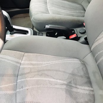 Enterprise Rent-A-Car - Stained seats. I sat on a trash bag the whole time - Car Rental Near Me - Tomball, Texas