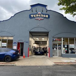 Tedesco Auto Body - The photo depicts the Tedesco Auto Body building head-on located in New Rochelle, NY, with its front entrance standing proudl...
