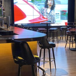 View of the big screen tv area with its own bar
