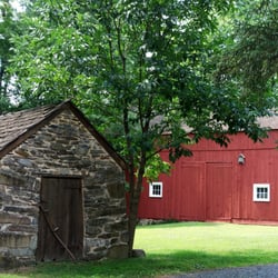 Inn At Glencairn - A view of our red frame barn and stone smokehouse dating back to the 1700s.