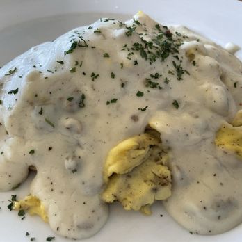 Big Bad Breakfast - Mobile - Biscuit and sausage gravy with a scrambled egg. - Breakfast & Brunch Near Me - Mobile, Alabama