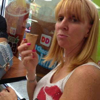 Baskin-Robbins - a woman eating an ice cream cone - Ice Cream & Frozen Yogurt Near Me - New York, New York Baskin-Robbins - a woman eating an ice cream cone - Ice Cream & Frozen Yogurt Near Me - New York, New York