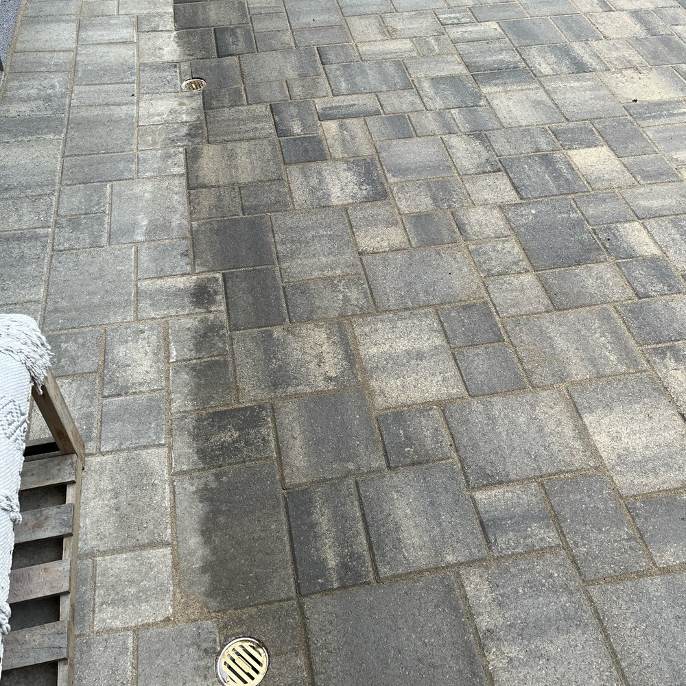 We replaced mud and cracked cement with pavers.