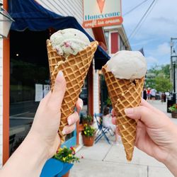 Honeycone Craft Ice Cream - Blackberry Basil & Honey Cinnamon in a waffle cone.