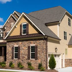 Southern Exteriors - Beautiful exterior home by Southern Siding and Gutters