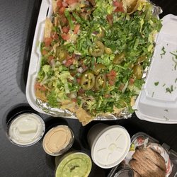 Burritos Mexican Grill - Chicken and steak nachos, churros