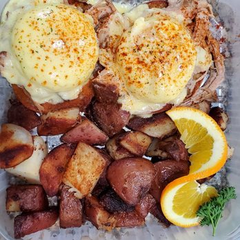 Aloha Stacks - Kalua pork benedict - egg benedict with the Kalua pork a good combo plus the seasoned potatoes and sriracha - Pancakes Near Me - Cerritos, California Aloha Stacks - Kalua pork benedict - egg benedict with the Kalua pork a good combo plus the seasoned potatoes and sriracha - Pancakes Near Me - Cerritos, California