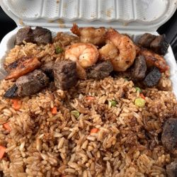Mr. PJ's Go Wings & Hibachi - Steak and shrimp fried rice with peas and carrots plate