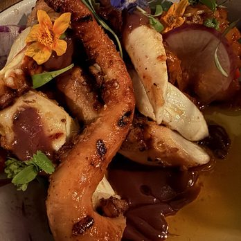 Bar167 - SPANISH OCTOPUS - Chorizo & sofrito potatoes, kalamata purée, herb salad - Cocktail Bars Near Me - Charleston, South Carolina Bar167 - SPANISH OCTOPUS - Chorizo & sofrito potatoes, kalamata purée, herb salad - Cocktail Bars Near Me - Charleston, South Carolina