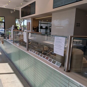 sweetgreen - Healthy Salads, Wraps, and Bowls - Front counter where the employees build your entrees - Salad Near Me - San Diego, California sweetgreen - Healthy Salads, Wraps, and Bowls - Front counter where the employees build your entrees - Salad Near Me - San Diego, California