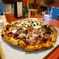 Tom's Pizza - Half donair half meat lovers pizza